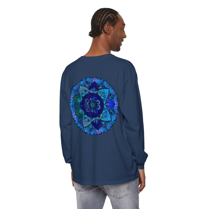 A close-up image of a dark blue and green mandala long sleeve t-shirt