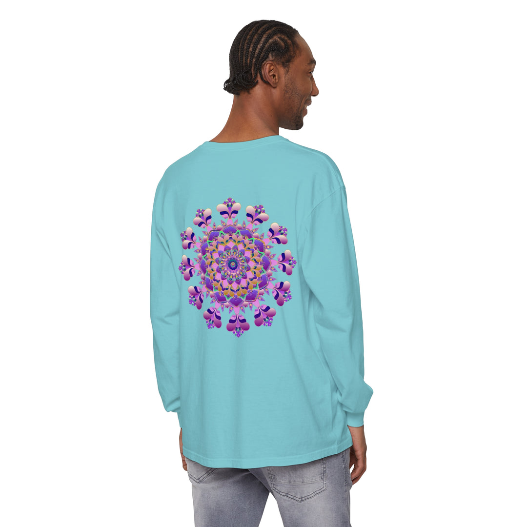 A close-up image of a black long sleeve t-shirt with an intricate mandala design, suitable for both men and women