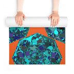 Geometrische Yogamatte aus Schaumstoff in energetischem Orange- und Aqua-Design