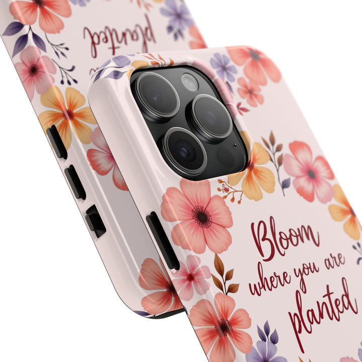 A light pink phone case with a beautiful flower garland design