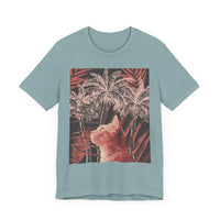 A colorful and playful t-shirt featuring a ginger cat lounging under a vibrant palm tree