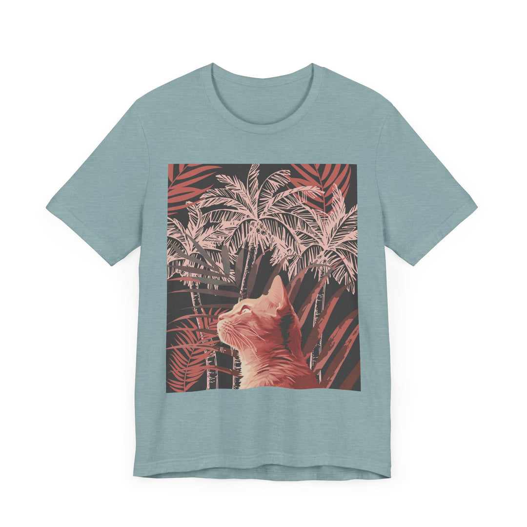 A colorful and playful t-shirt featuring a ginger cat lounging under a vibrant palm tree