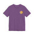 Colorful, intricate mandala tee with vibrant patterns, evoking spiritual peace and harmony in its design