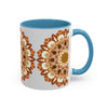 A beautiful mandala art mug with intricate designs on a light grey background