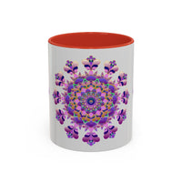 A beautifully designed mandala mug in shades of purple and pink with intricate floral patterns
