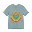A close-up of a vibrant mandala tee featuring intricate and detailed art and design