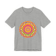 A vibrant and detailed mandala design adorning a colorful tee
