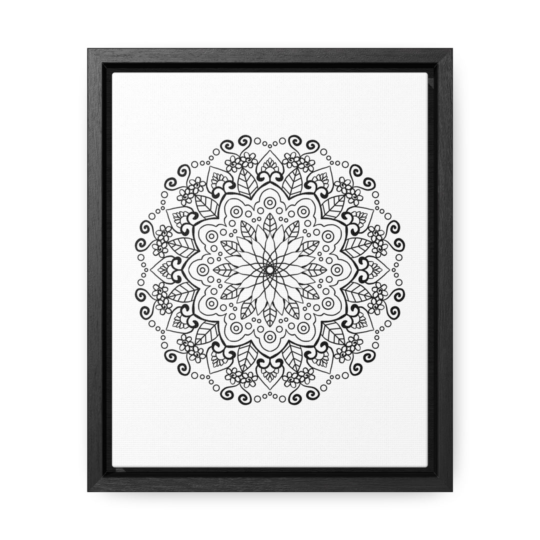 A stunning handmade black and white mandala art piece on gallery canvas wraps in a vertical frame