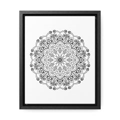 A stunning handmade black and white mandala art piece on gallery canvas wraps in a vertical frame