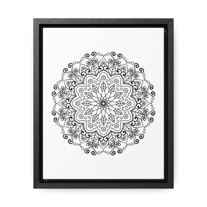 A stunning handmade black and white mandala art piece on gallery canvas wraps in a vertical frame