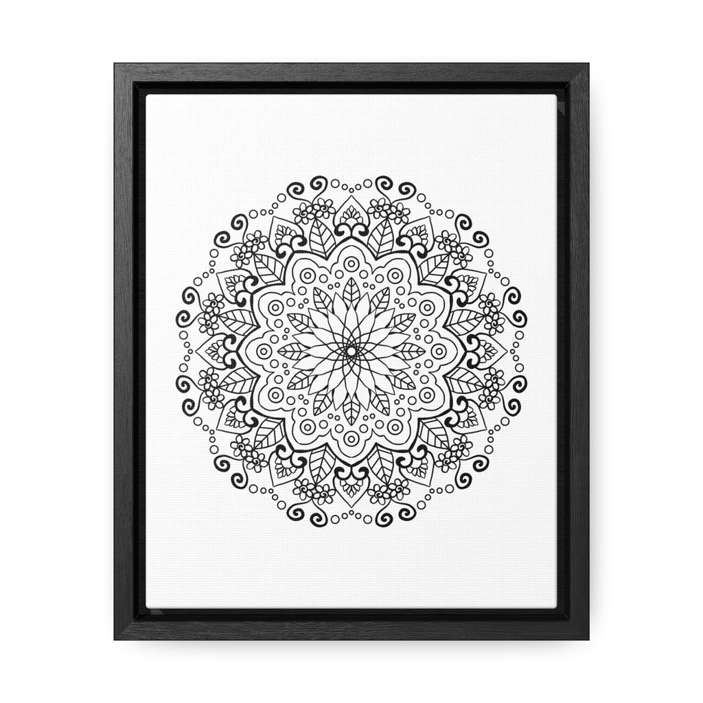 A stunning handmade black and white mandala art piece on gallery canvas wraps in a vertical frame