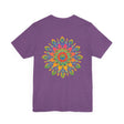 Colorful and intricate psychedelic mandala design on a t-shirt promoting spiritual peace and harmony