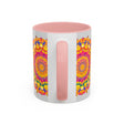 A close-up image of a grey mug with vibrant mandala art featuring intricate designs and bold colors