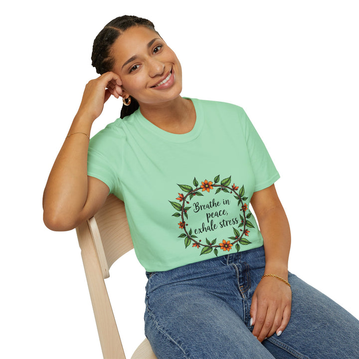 Beautiful white t-shirt with a floral garland design and the phrase 'Breathe in Peace Exhale Stress' written in elegant script