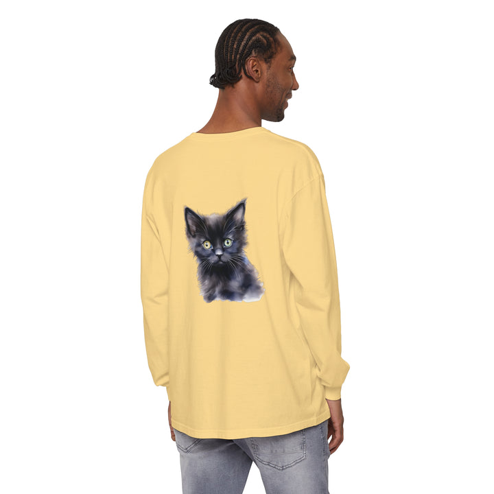 A close-up image of a black unisex long sleeve t-shirt with a mystical kitten graphic print