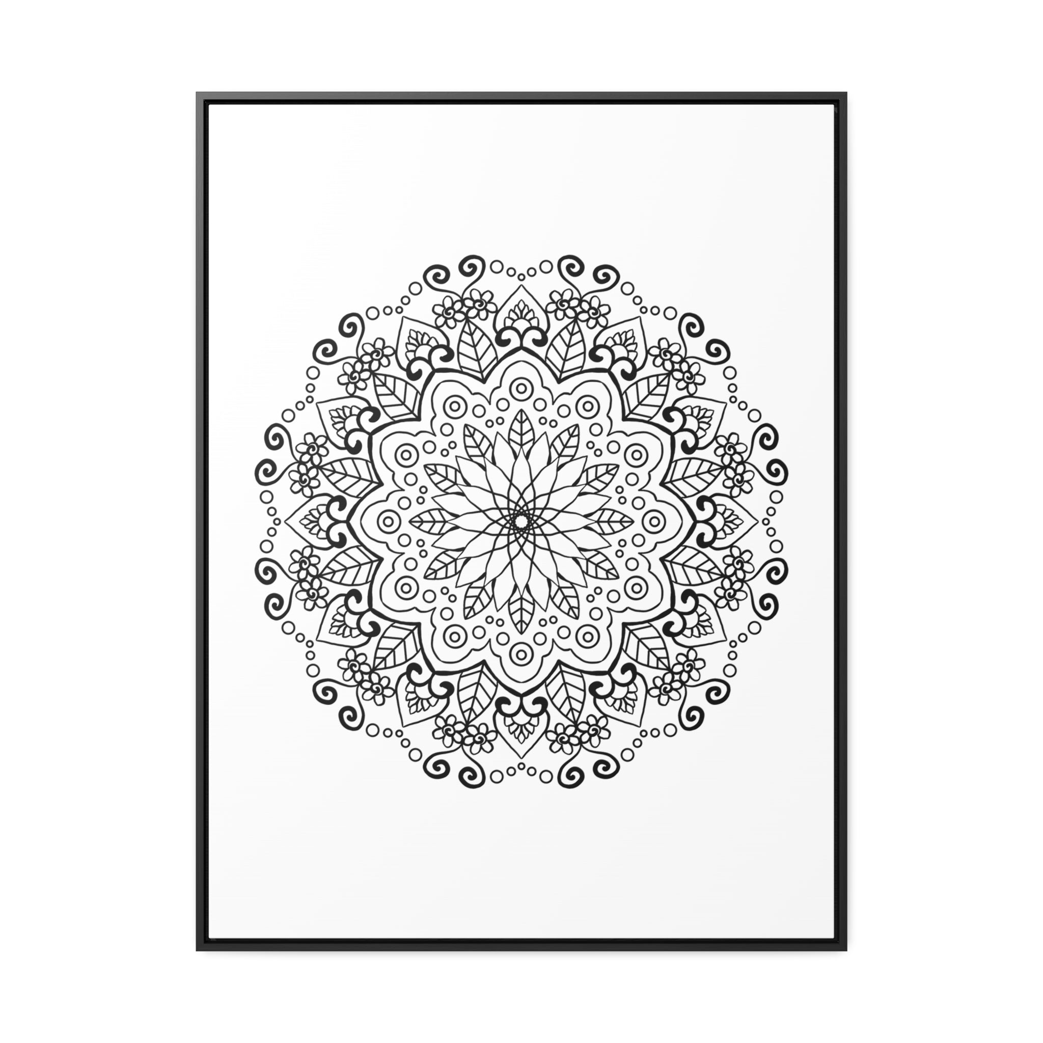 Beautiful mandala handmade art in black and white, displayed on gallery canvas wraps in a vertical frame