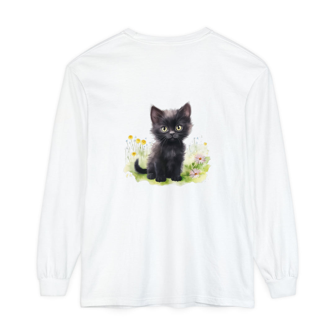 A cute black kitten playing in a colorful flower garden printed on a long sleeve t-shirt