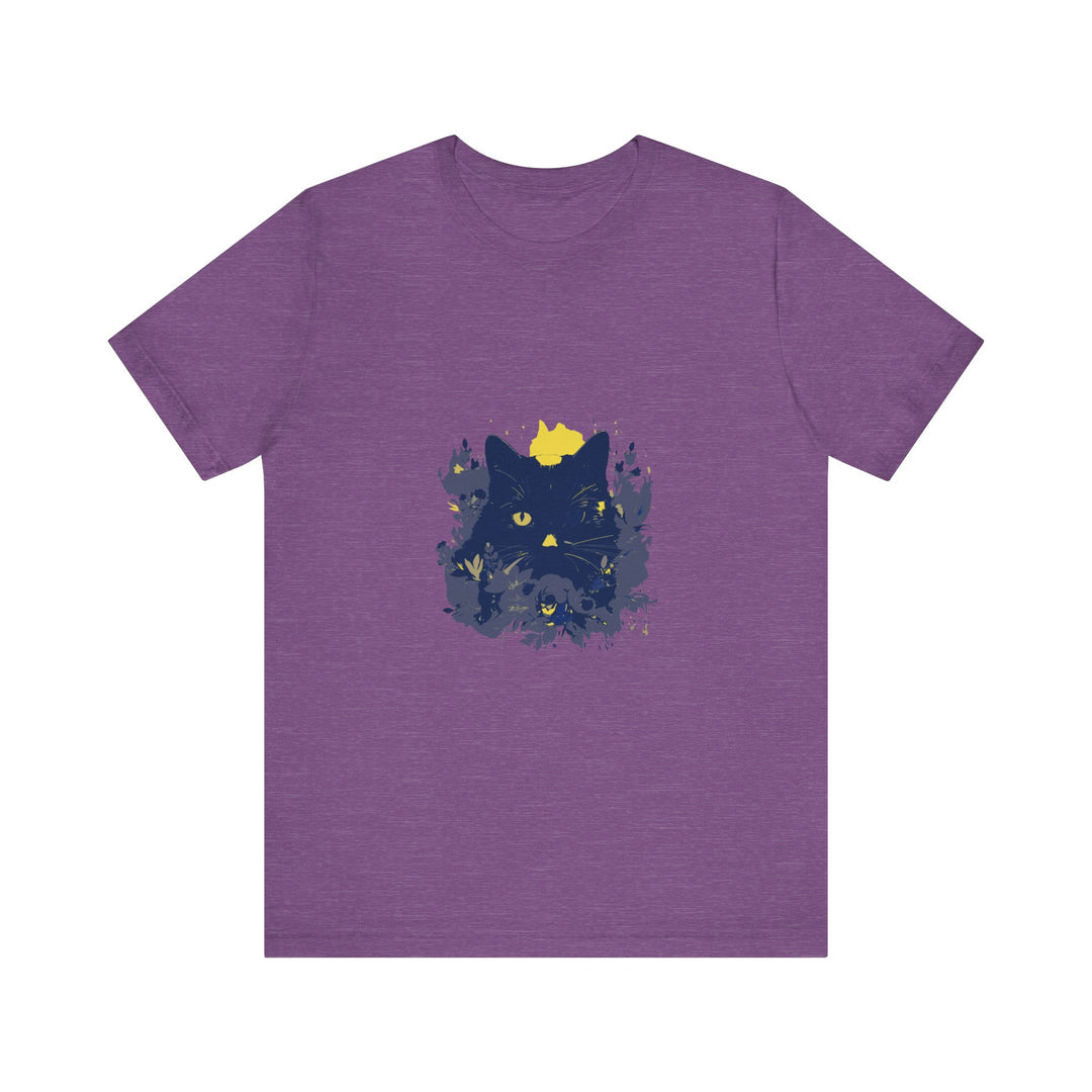 A black cat with a mischievous expression wearing a t-shirt featuring whimsical flowers