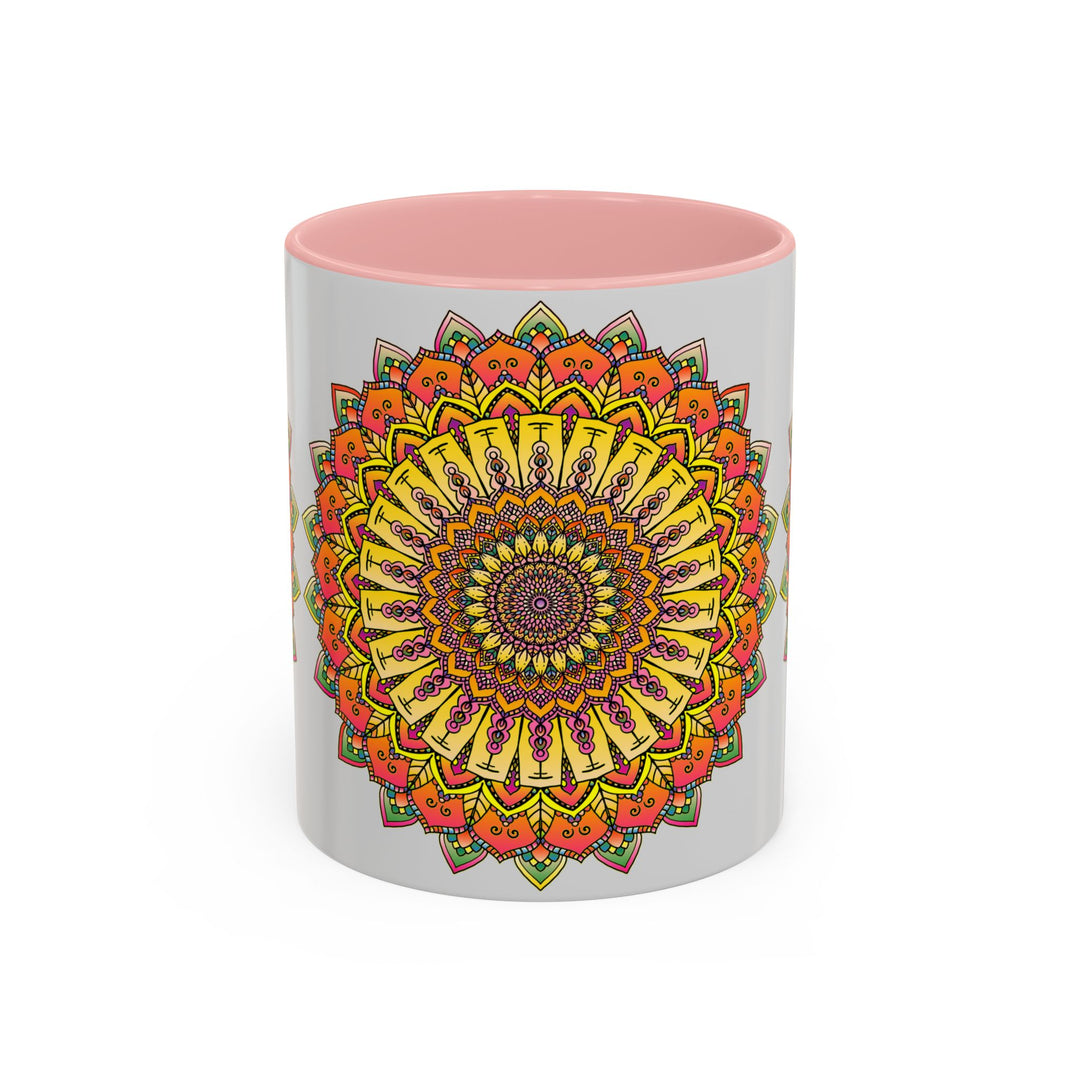 Large coffee mug with vibrant mandala art in various colors on grey background