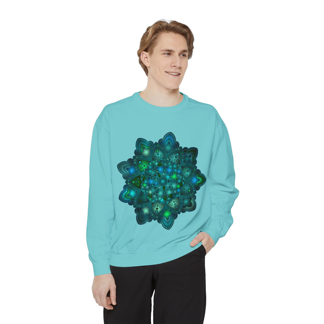 Intricate blue and green mandala sweatshirt with detailed geometric patterns and vibrant colors for a stylish and comfortable look