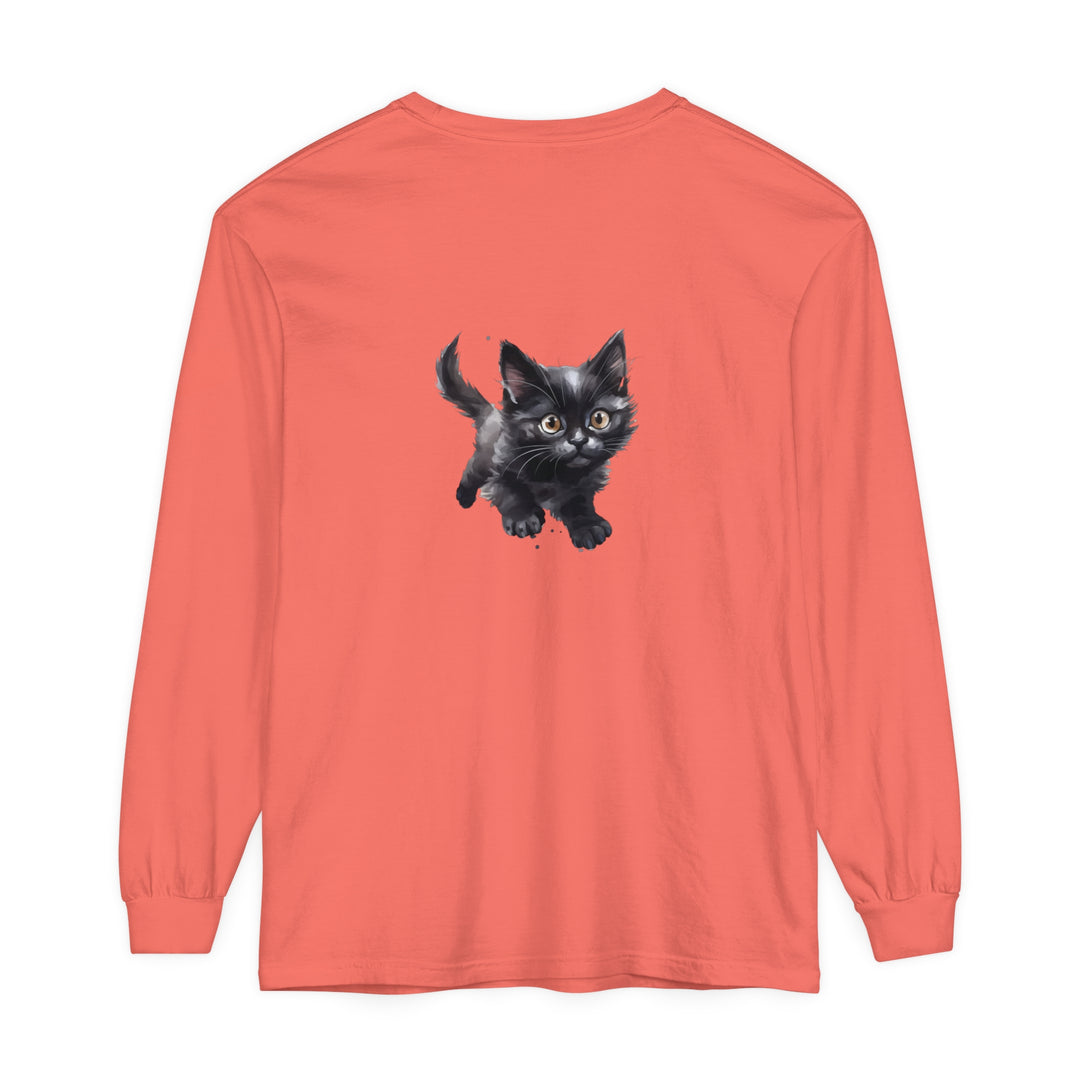 A colorful watercolor illustration of a playful kitten on a T-shirt