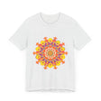 A close-up image of a vibrant mandala tee featuring a colorful and intricate design with a mix of floral and geometric patterns in shades of red, blue, yellow, and green