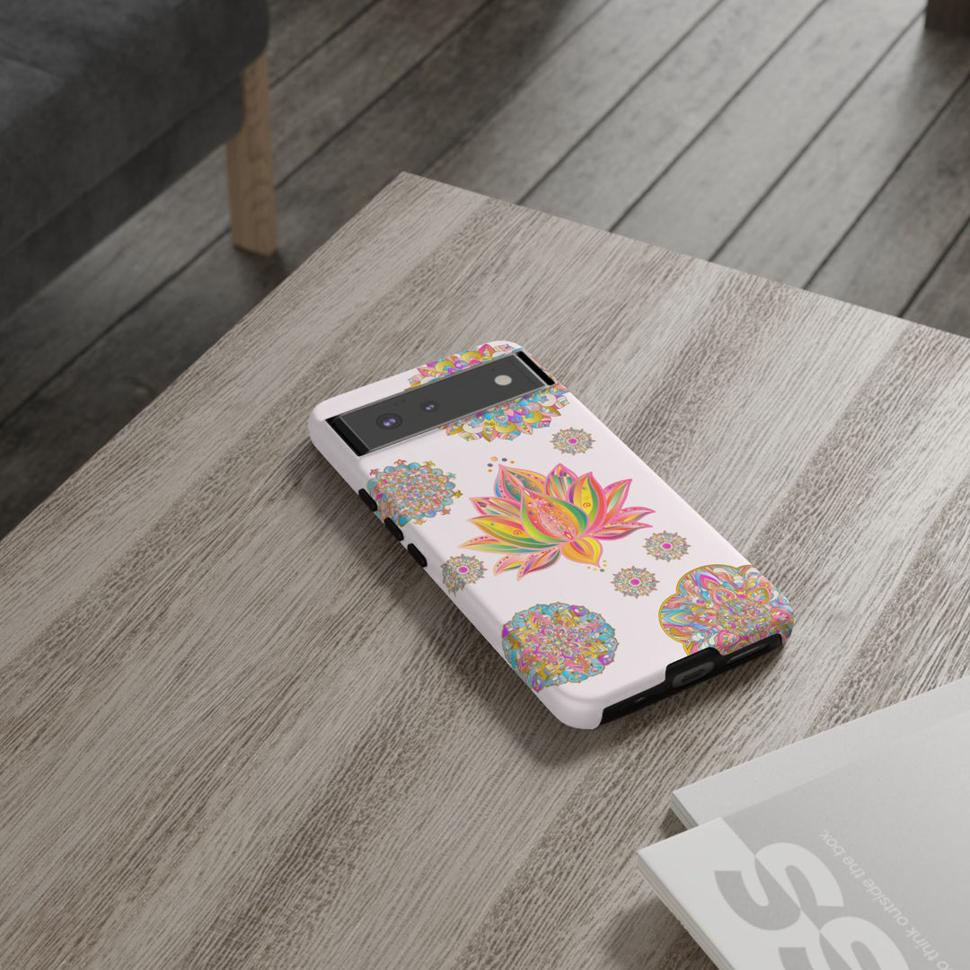 A close-up image of a light pink phone case featuring a mandala design with a lotus flower, perfect for adding a touch of elegance and spirituality to your smartphone