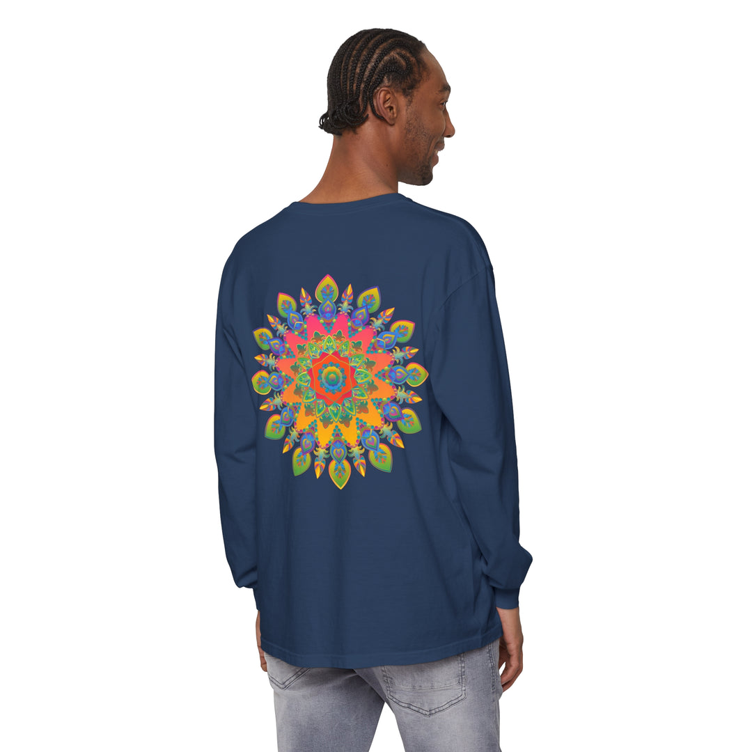 A close-up image of a colorful mandala design on a unisex long sleeve t-shirt