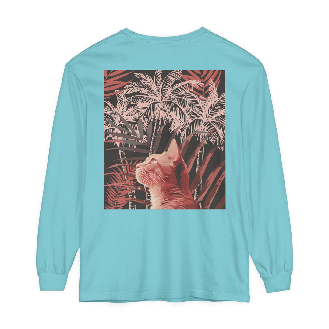 Adorable ginger cat resting under a lush palm tree on a comfortable t-shirt