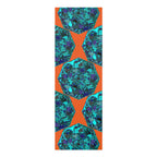 Geometrische Yogamatte aus Schaumstoff in energetischem Orange- und Aqua-Design