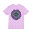 A close-up image of a white t-shirt with a colorful mandala design, representing spiritual peace and harmony