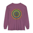 A close-up image of an intricate mandala design on a unisex long sleeve t-shirt