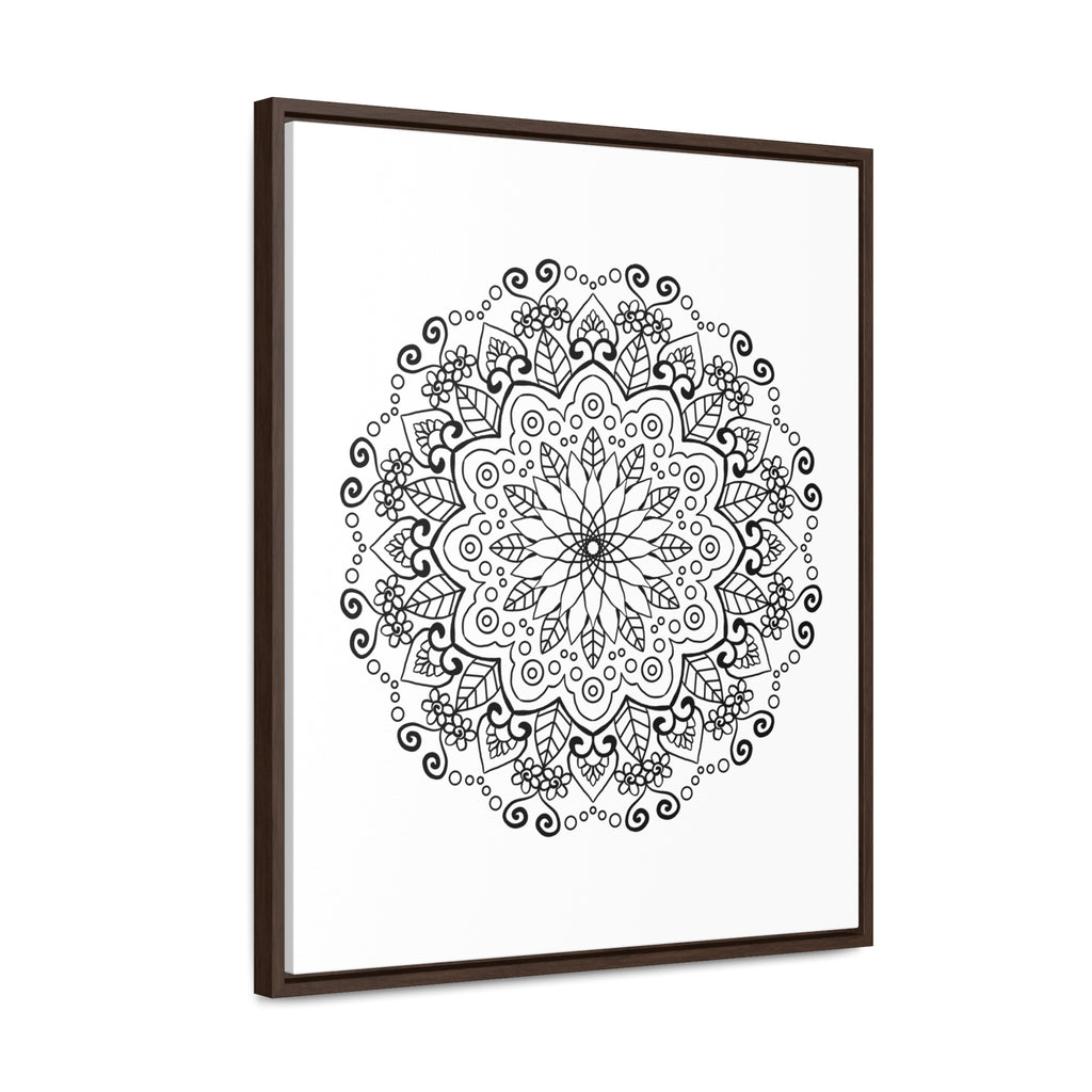 A stunning black and white handmade mandala art piece on gallery canvas wraps, beautifully displayed in a vertical frame