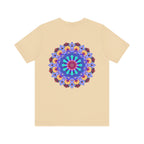 A close-up image of a white t-shirt featuring a vibrant mandala design with peaceful and harmonious elements, perfect for those seeking spiritual art