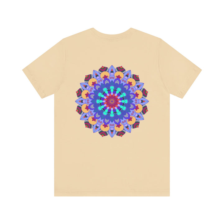 A close-up image of a white t-shirt featuring a vibrant mandala design with peaceful and harmonious elements, perfect for those seeking spiritual art