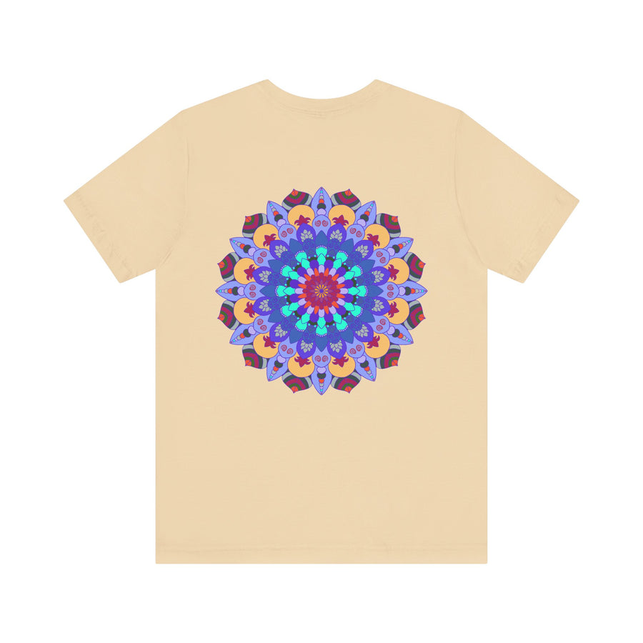 A close-up image of a white t-shirt featuring a vibrant mandala design with peaceful and harmonious elements, perfect for those seeking spiritual art