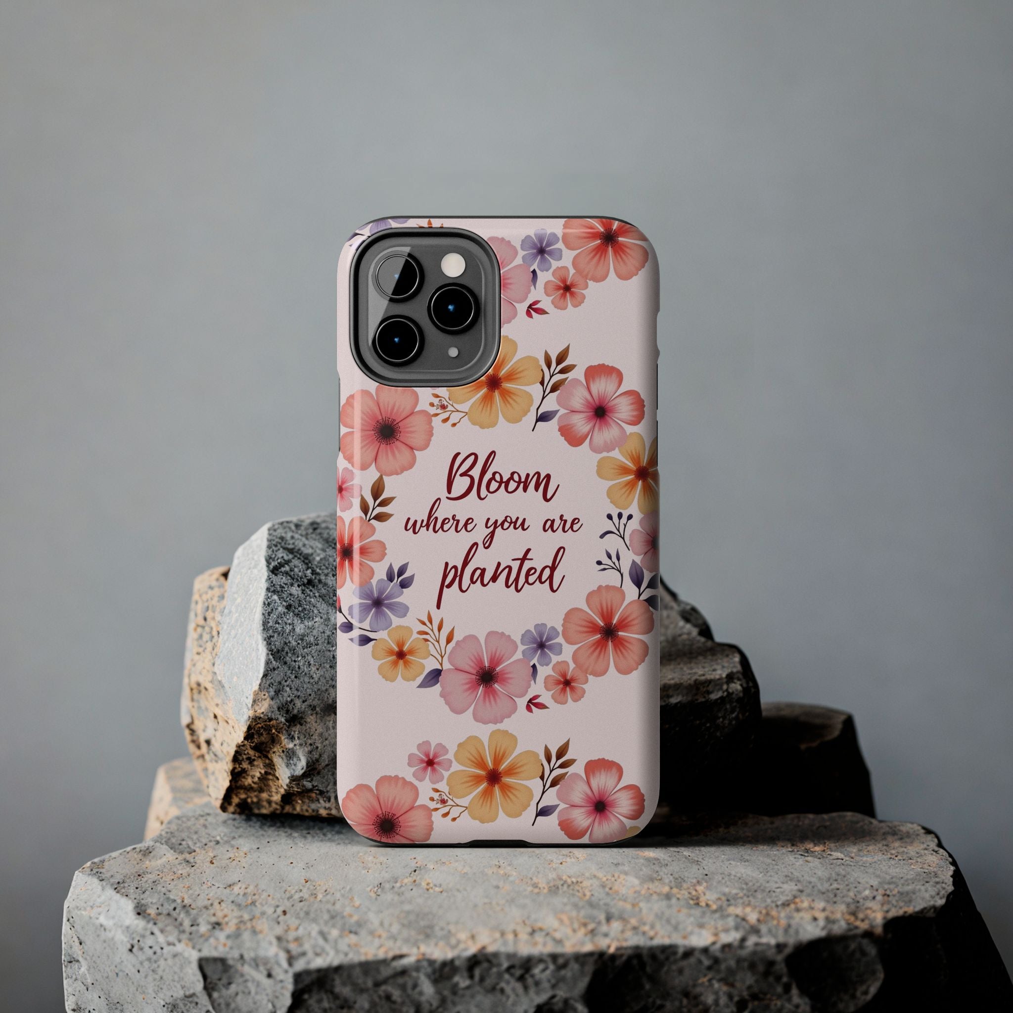 Light pink phone case with a beautiful flower garland design, perfect for those who love to bloom where they are planted