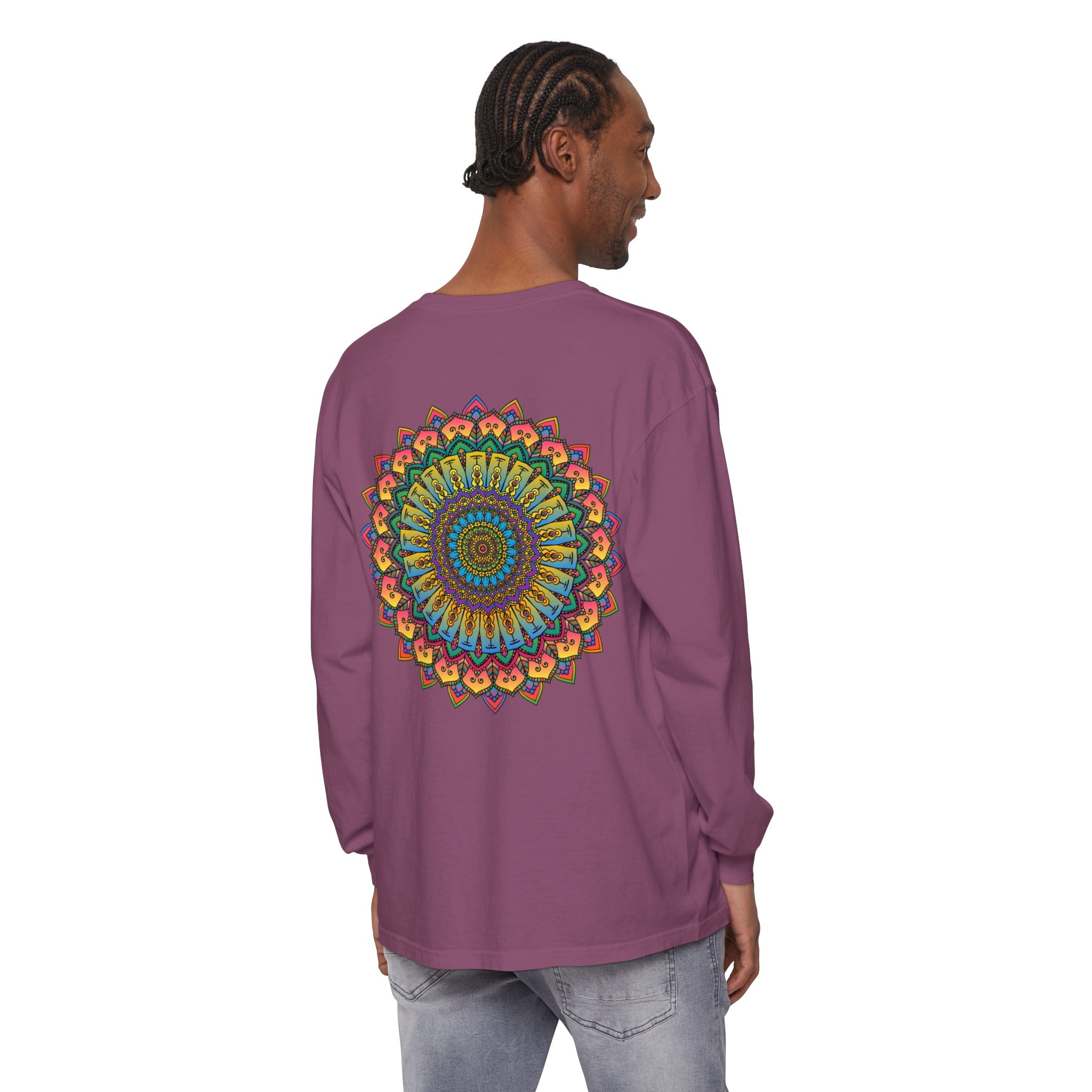 A close-up image of a black long sleeve t-shirt with an intricate and colorful mandala design, suitable for both men and women