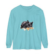 A realistic watercolor painting of a sleeping black cat on a soft, comfortable t-shirt