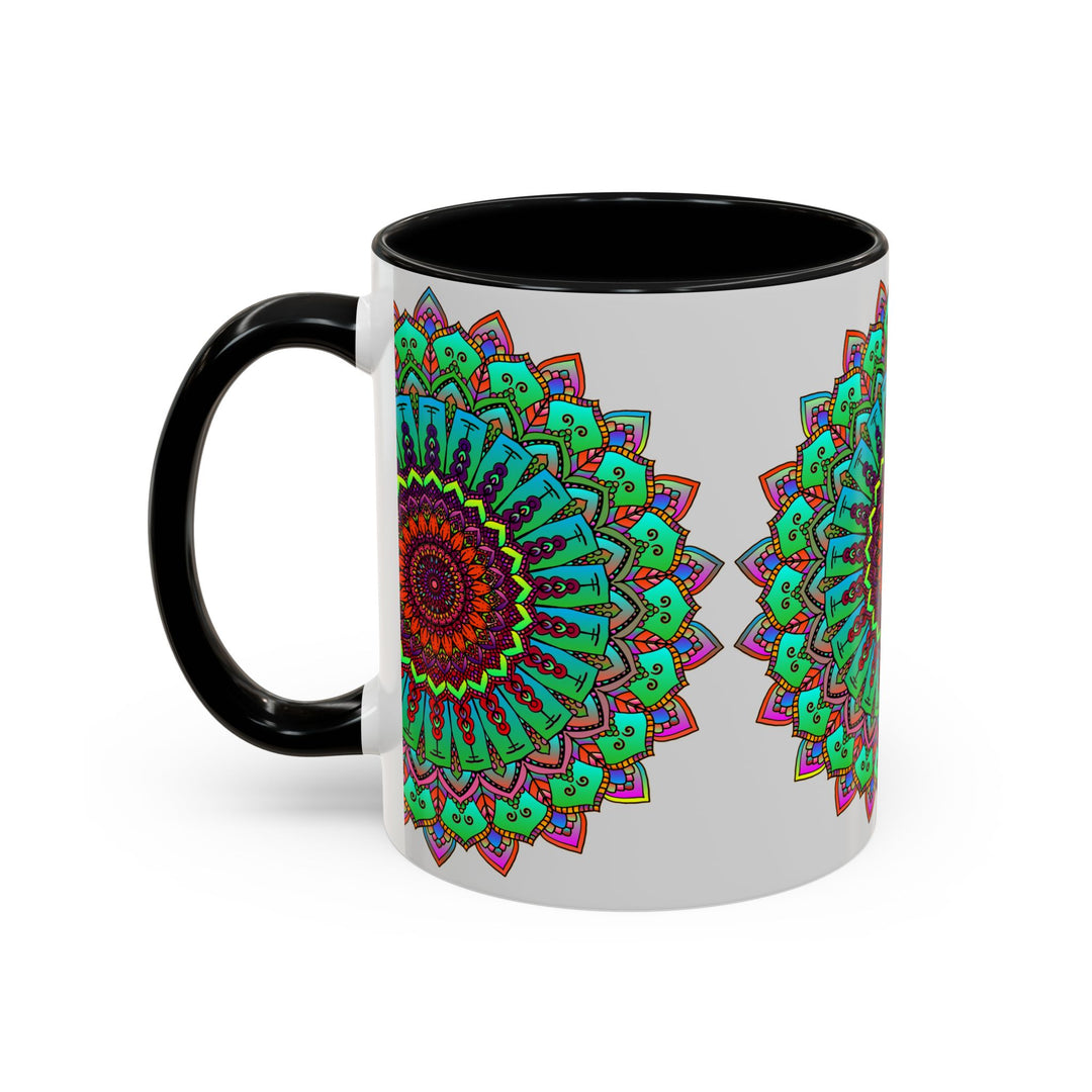 A light grey ceramic mug featuring a colorful mandala design