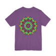 A stunning and colorful mandala design adorns this vibrant t-shirt, promoting peace and harmony with its intricate and eye-catching pattern