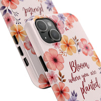 Light pink phone case with a beautiful flower garland design called 'Bloom where you are planted', perfect for adding a touch of nature to your device