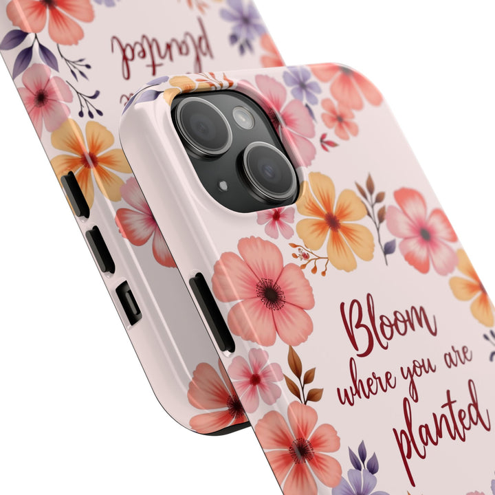 Light pink phone case with a beautiful flower garland design called 'Bloom where you are planted', perfect for adding a touch of nature to your device