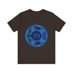 A close-up image of a dark blue and green mandala t-shirt featuring intricate spiritual art designs