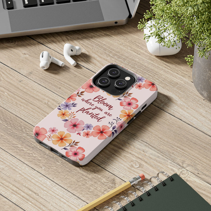 Beautiful light pink phone case adorned with a flower garland bloom design