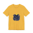 A black cat with a mischievous look wearing a t-shirt with whimsical flowers design