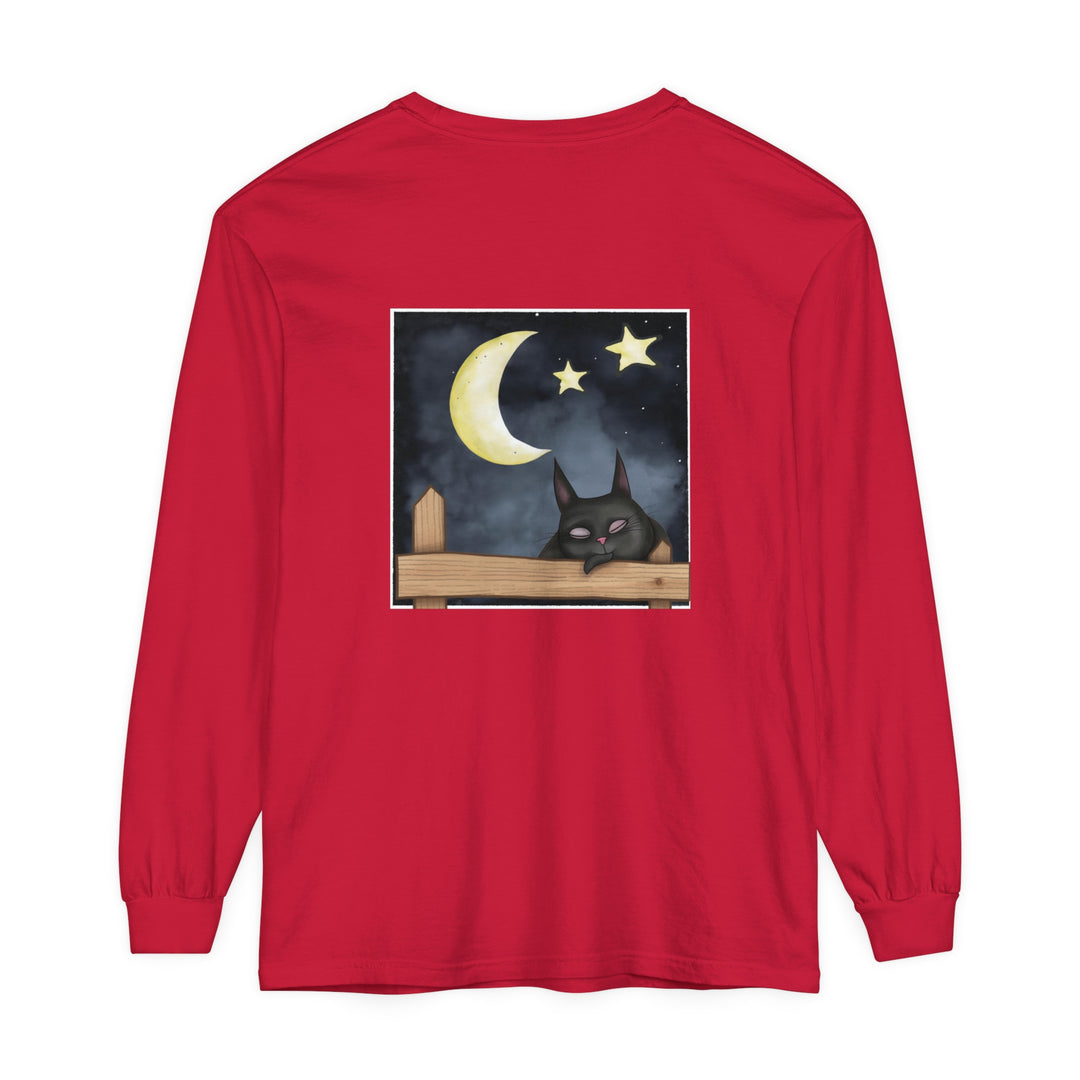 A black t-shirt with a charming illustration of a sleepy cat under the night sky