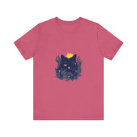 A black cat with a mysterious expression wearing a whimsical flower-patterned t-shirt