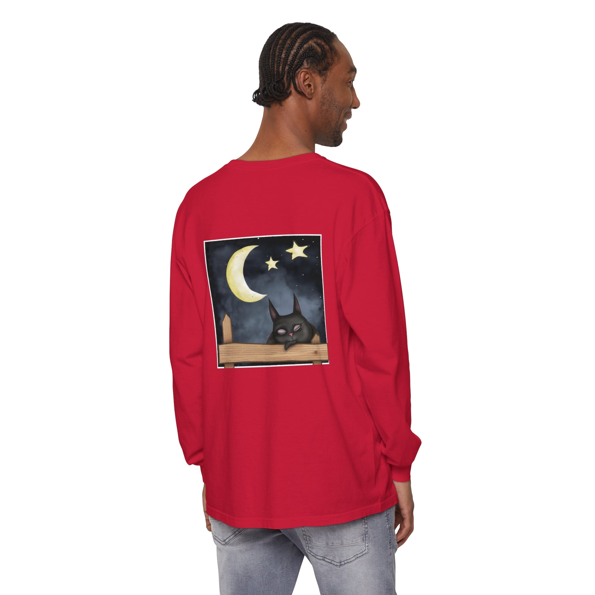 A comfortable black t-shirt featuring a sleepy cat under the night sky