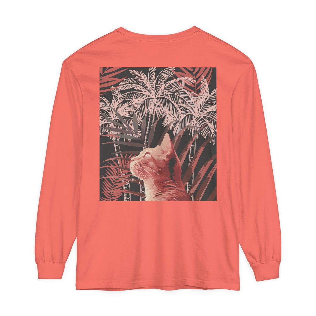 A cute ginger cat laying under a palm tree on a t-shirt